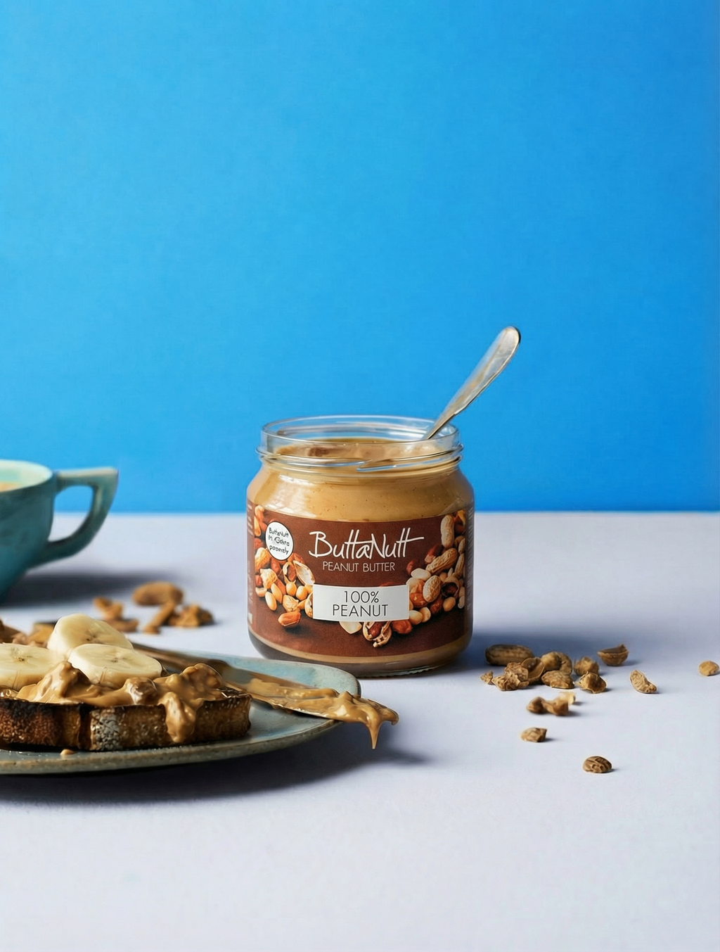 Peanut butter on a spoon with bread — Food Trader